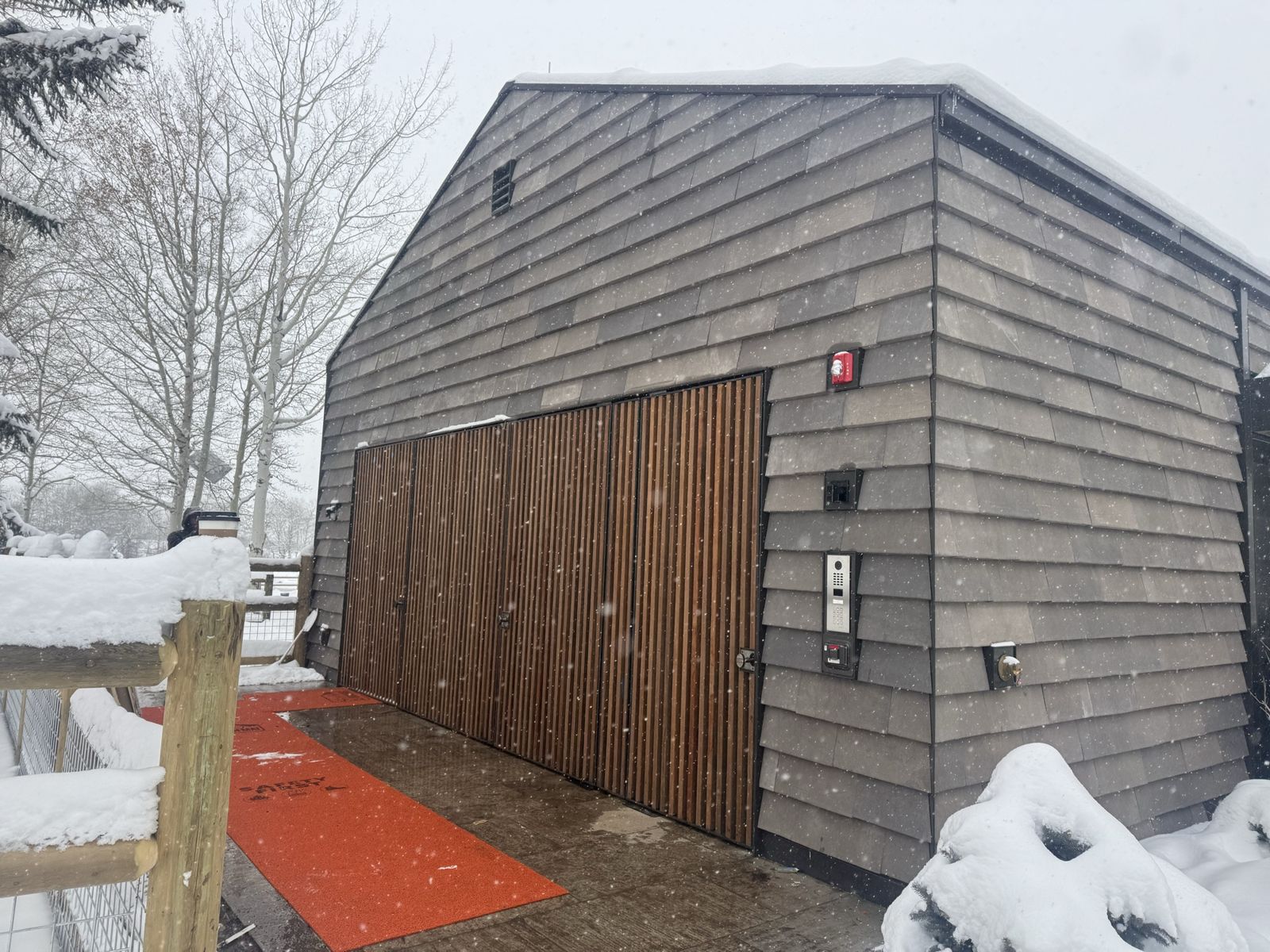 Exterior facade with stone shingle cladding