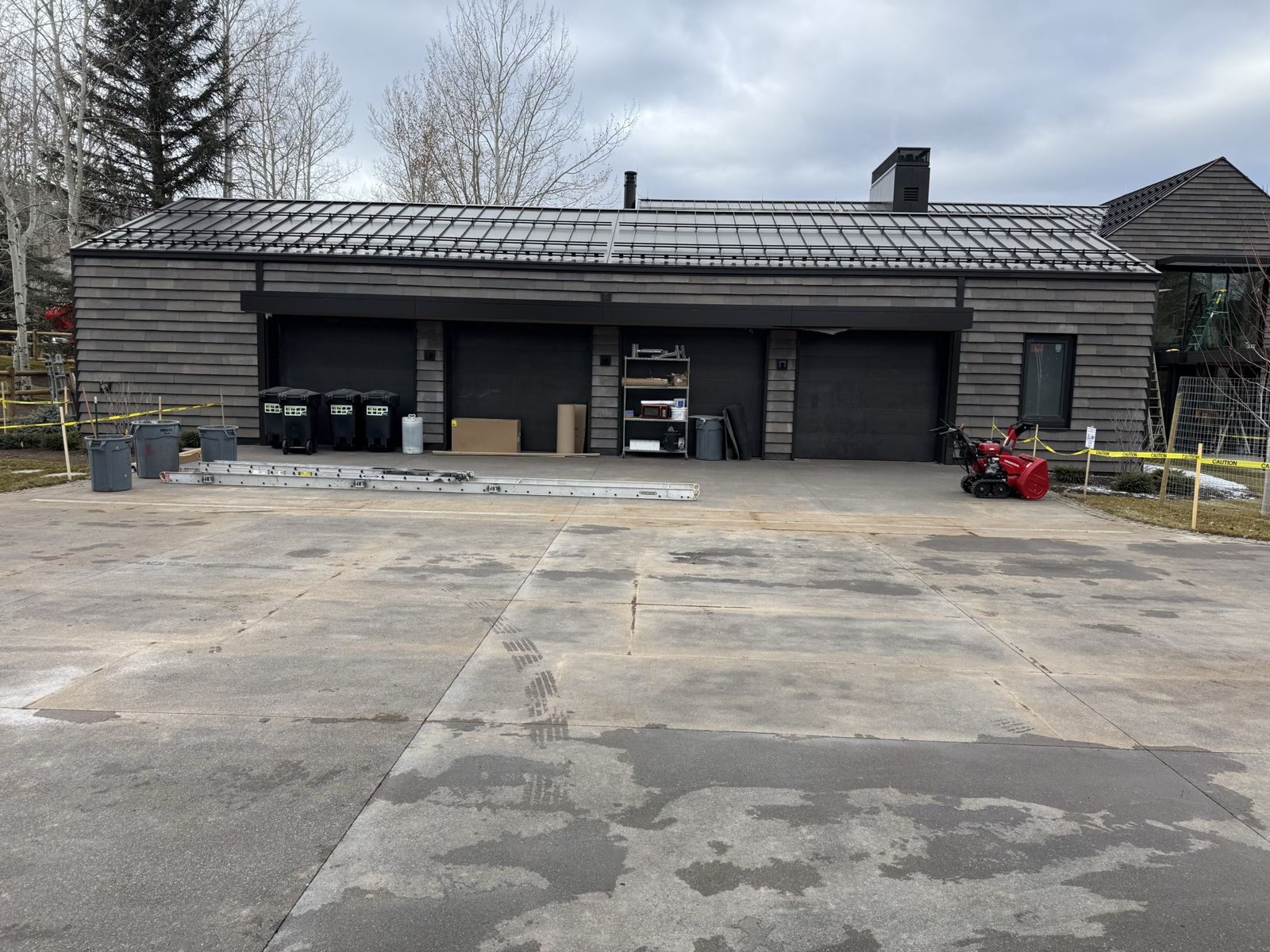 Garage elevation with slate shingle siding