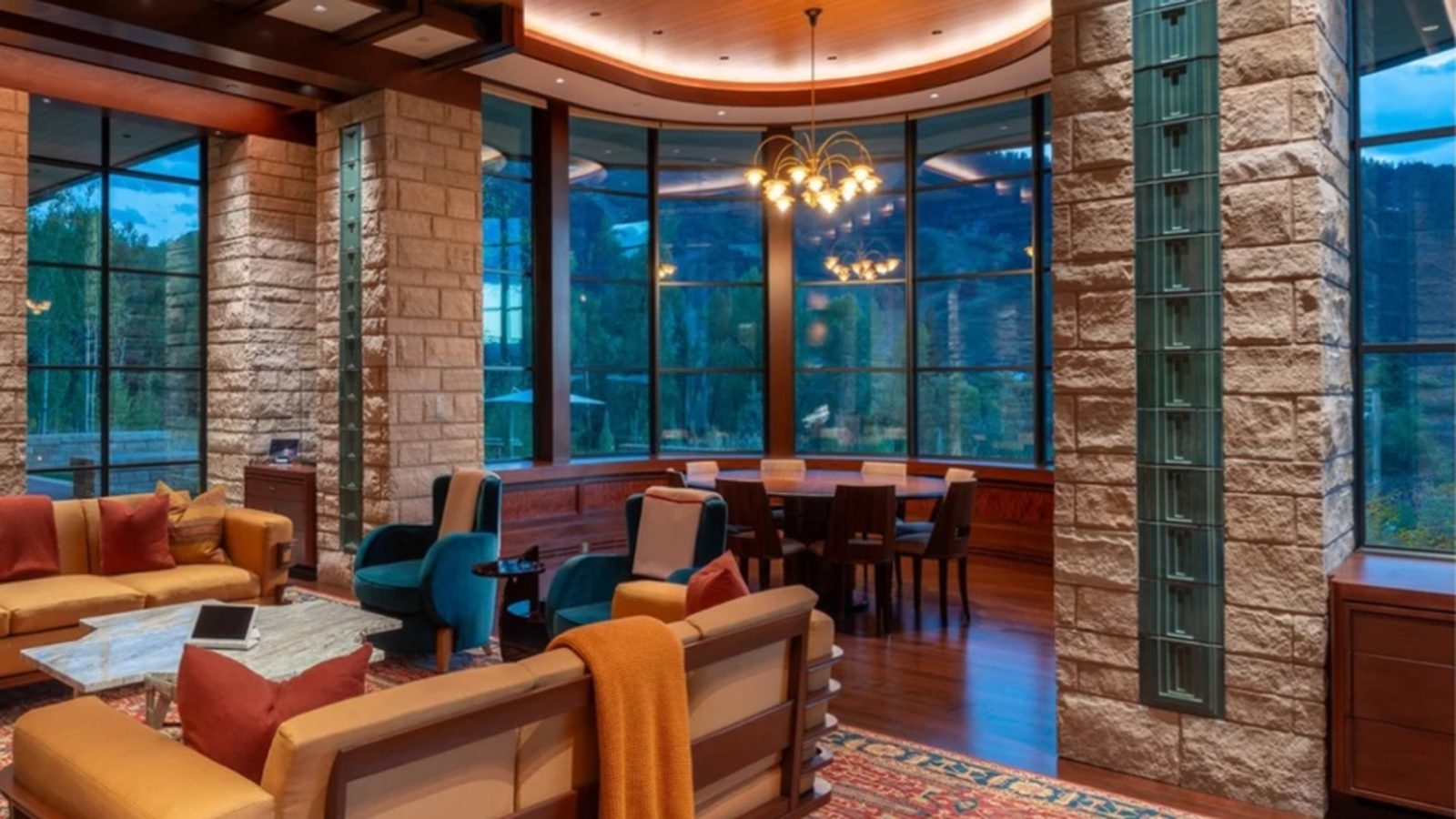 American Lane — green terracotta inlays anchor the stone pillars in the finished living and dining