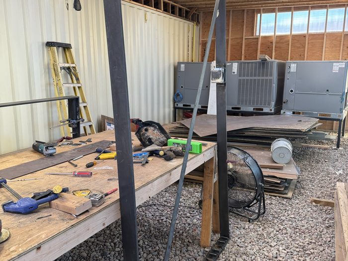 Frame standing vertical, notches routed along the top and bottom rails.